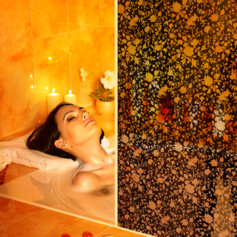 Woman take bubble  bath.